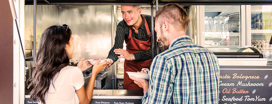 Image of a mobile business taking a tap and go card payment.